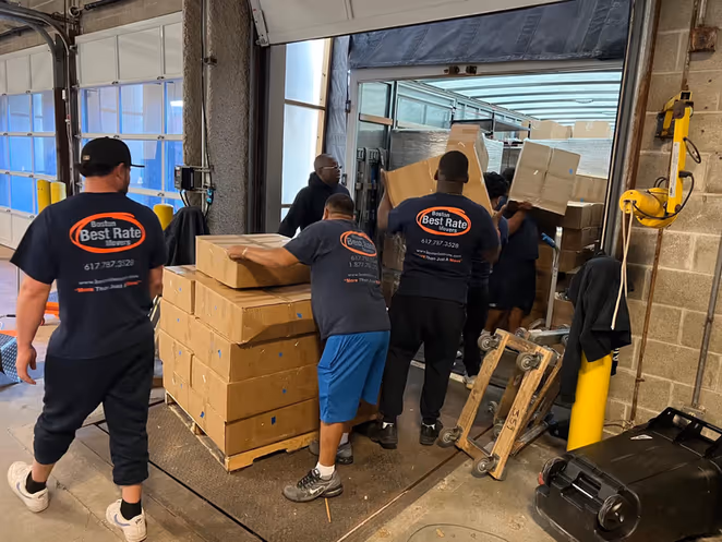BBRM team loading office equipment at commercial dock