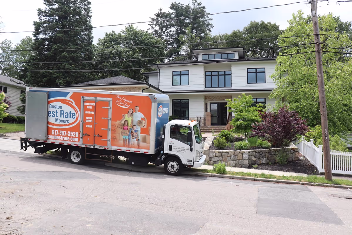 Local movers loading a truck in Boston
