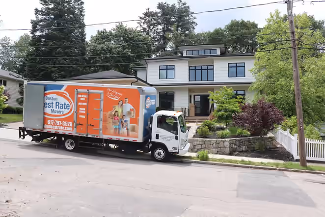 Boston Best Rate Movers truck parked at a residential home for local moving service
