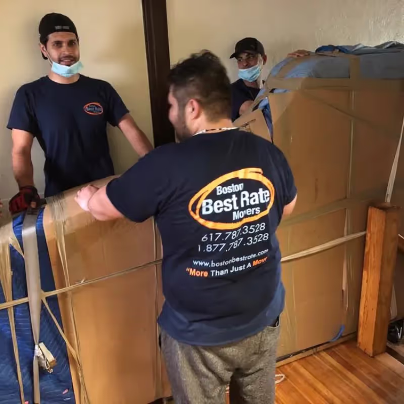 BBRM crew carefully moving a piano